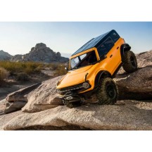 Coche RC Traxxas TRX-4 Ford Bronco 2021 1/10 4WD RTR con carrocería sin clips en color naranja TRX92076-4ORNG
