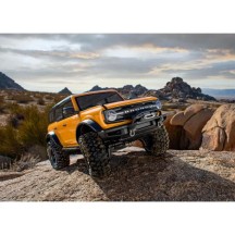 Coche RC Traxxas TRX-4 Ford Bronco 2021 1/10 4WD RTR con carrocería sin clips en color naranja TRX92076-4ORNG