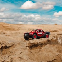 Arrma 1-16 MOJAVE GROM 4X4 RTR Brushed Desert Truck Battery & Charger Included Red-Black ARA2104T1
